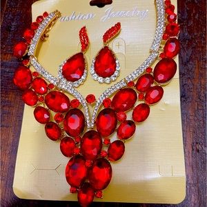 Necklace with pair of earrings -both color red